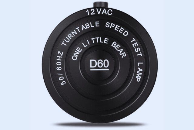 Use tachometer disc check fluctuation in turntable speed