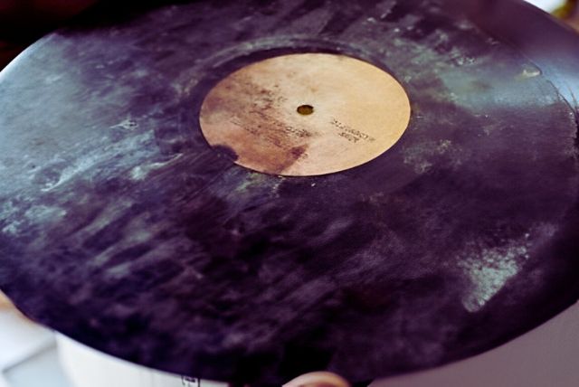 Dust or dirt on the vinyl record surface